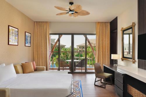 Suite, 1 bedroom Suite, 1 King, Resort view, Balcony del hotel Lapita, Dubai Parks and Resorts, Autograph Collection. Foto 3