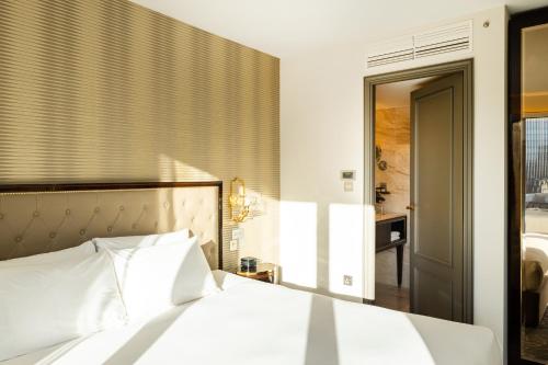 Suite con sofá cama - Cama extragrande del hotel Saint London. Foto 7