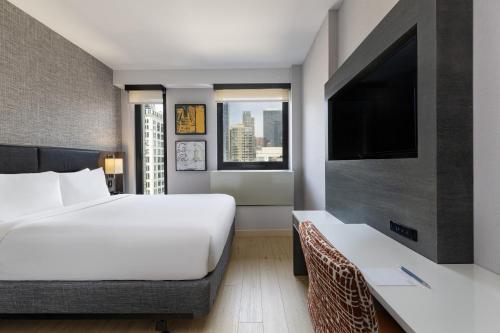 Habitación Doble Deluxe del hotel Four Points By Sheraton Manhattan Midtown West. Foto 4