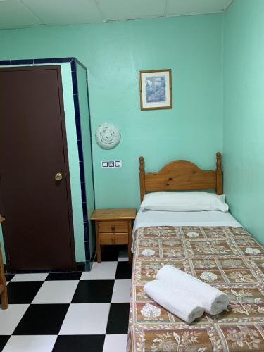 Habitación Individual con baño compartido del hotel Pensión Lisdos. Foto 1