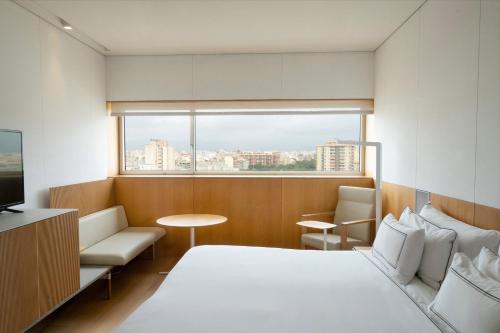 Habitación Doble Deluxe - 1 o 2 camas del hotel Melia Palma Bay. Foto 1