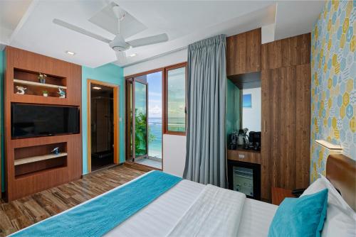 Habitación Doble Deluxe con vistas al mar, traslado gratuito de ida y vuelta al aeropuerto y 10% de descuento en comida y bebida - 1 cama doble del hotel H78 Maldives. Foto 7