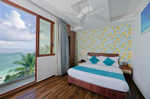 Habitación Doble Deluxe con vistas al mar, traslado gratuito de ida y vuelta al aeropuerto y 10% de descuento en comida y bebida - 1 cama doble del hotel H78 Maldives. Foto 11