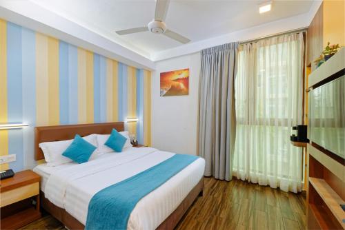 Habitación Doble Deluxe con traslado gratuito de ida y vuelta al aeropuerto 10% de descuento en alimentos y bebidas - 1 cama doble del hotel H78 Maldives. Foto 1