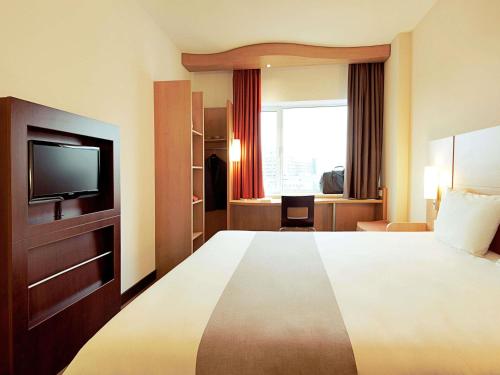 Habitación Doble Estándar del hotel Ibis Dijon Sud. Foto 1