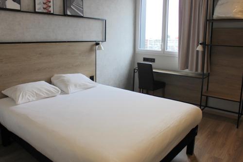 Habitación Doble Estándar del hotel Ibis Dijon Sud. Foto 6