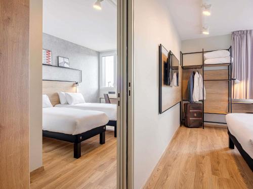 Habitación Doble Superior del hotel Ibis Dijon Sud. Foto 1