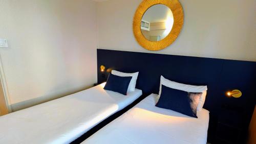 Habitación Standard con 2 camas individuales del hotel Ibis Grenoble Centre Bastille. Foto 1
