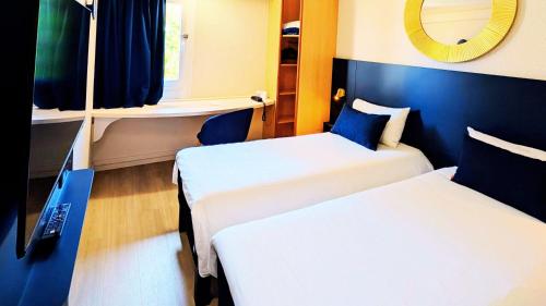 Habitación Standard con 2 camas individuales del hotel Ibis Grenoble Centre Bastille. Foto 3