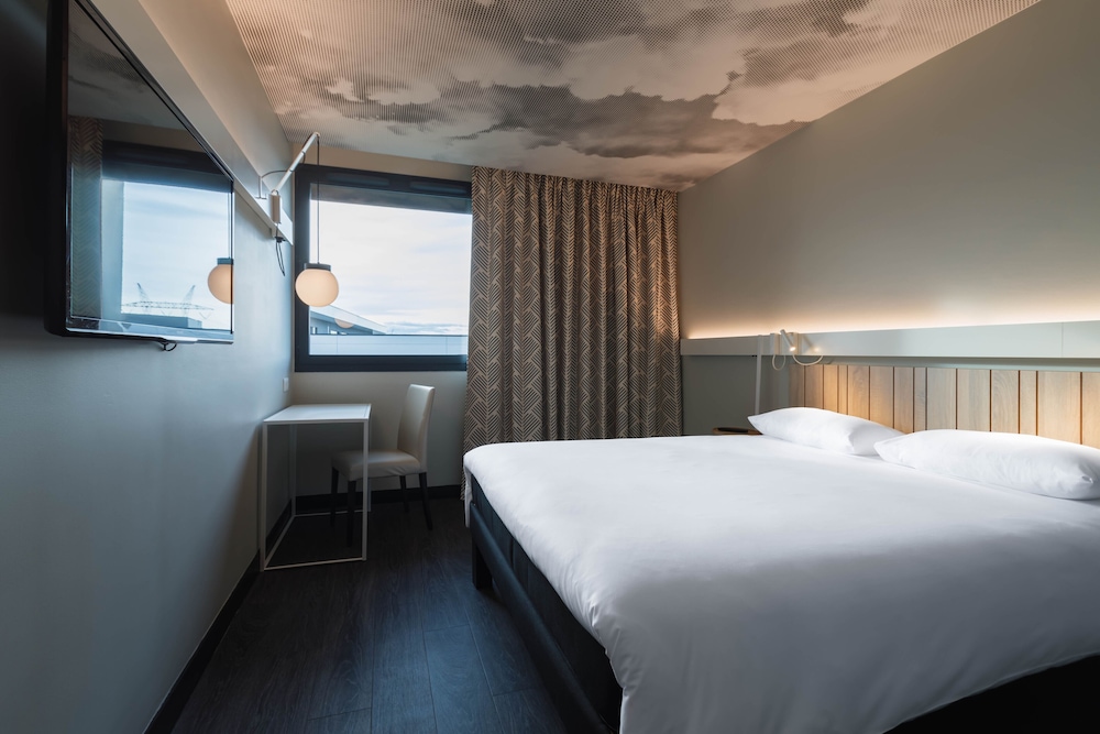 Habitación Estándar con cama doble del hotel ibis Lyon Meyzieu. Foto 3
