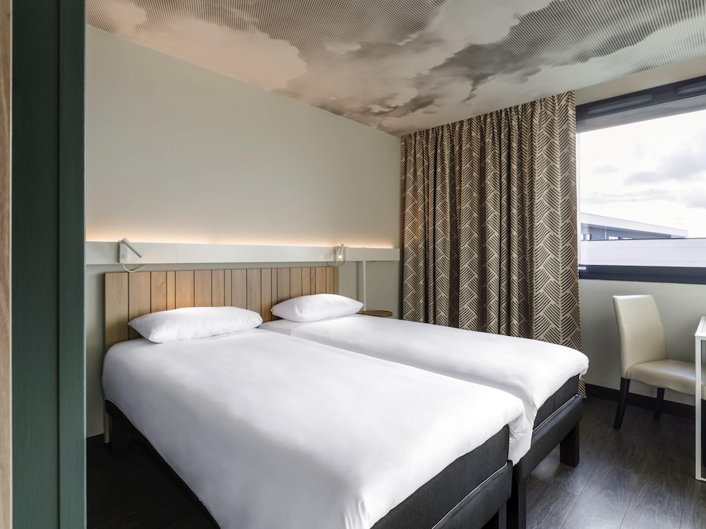 Habitación estándar con 2 camas individuales del hotel ibis Lyon Meyzieu