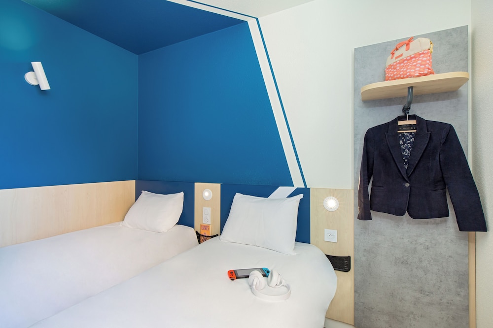 Habitación Standard con 2 camas individuales del hotel Ibis budget Valence Nord Plateau des Couleures. Foto 2