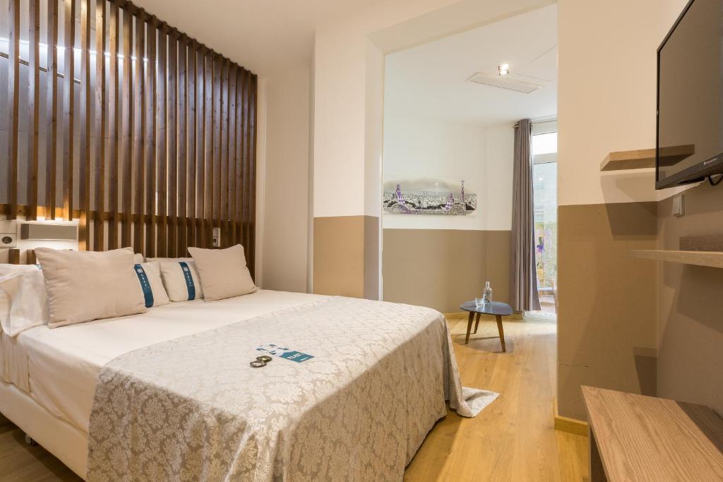 Habitación familiar Superior del hotel Cosmopolitan Boutique Rambla. Foto 1