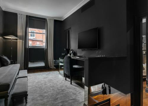 Habitación Triple del hotel The Franklin London - Starhotels Collezione. Foto 2