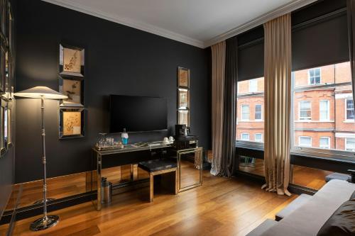 Habitación Triple del hotel The Franklin London - Starhotels Collezione. Foto 6