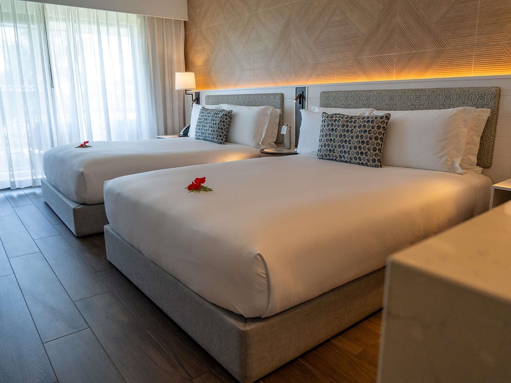 Habitación Superior con 2 camas queen size del hotel Sofitel Fiji Resort and Spa. Foto 1