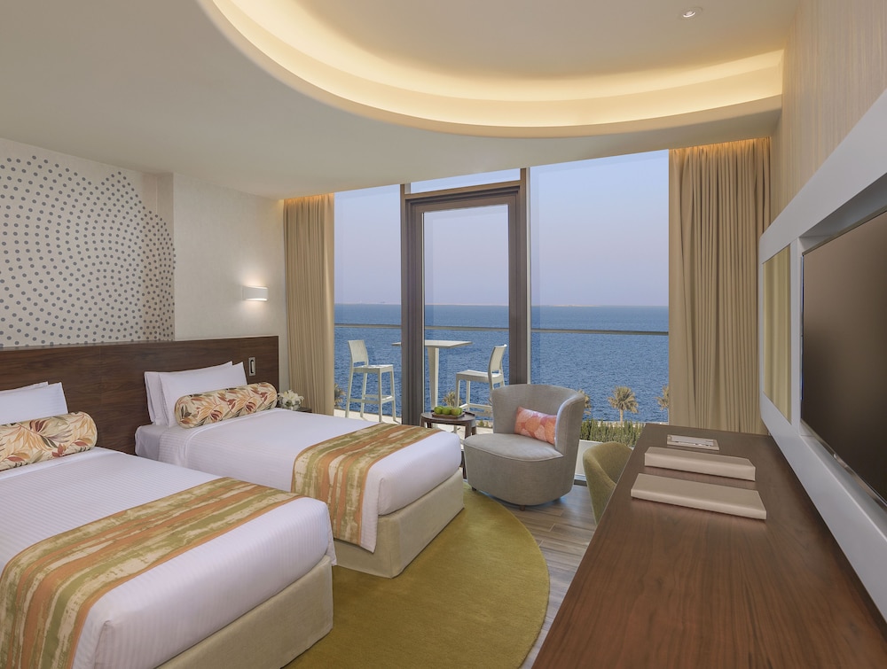 Habitación Deluxe con Balcón, Vista al Mar de Palmeras del hotel The Retreat Palm Dubai - MGallery by Sofitel. Foto 1