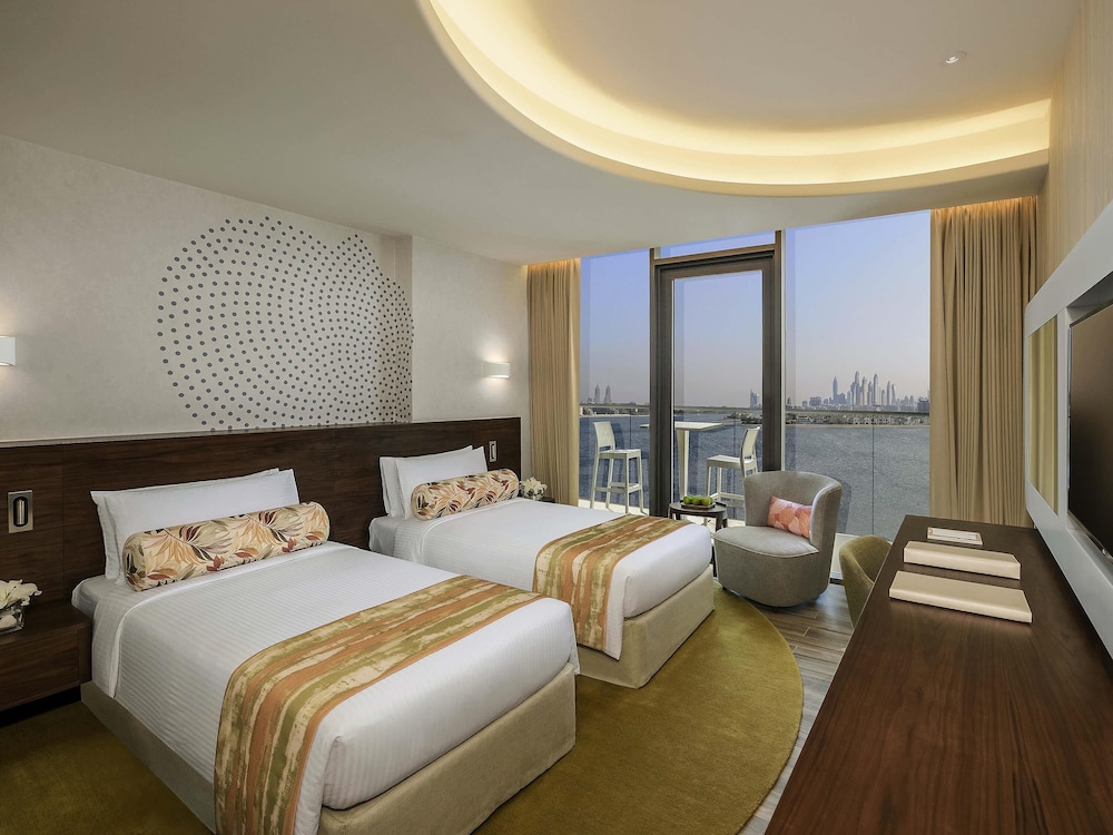 Habitación Deluxe con Balcón, Vista al Mar de Palmeras del hotel The Retreat Palm Dubai - MGallery by Sofitel. Foto 5