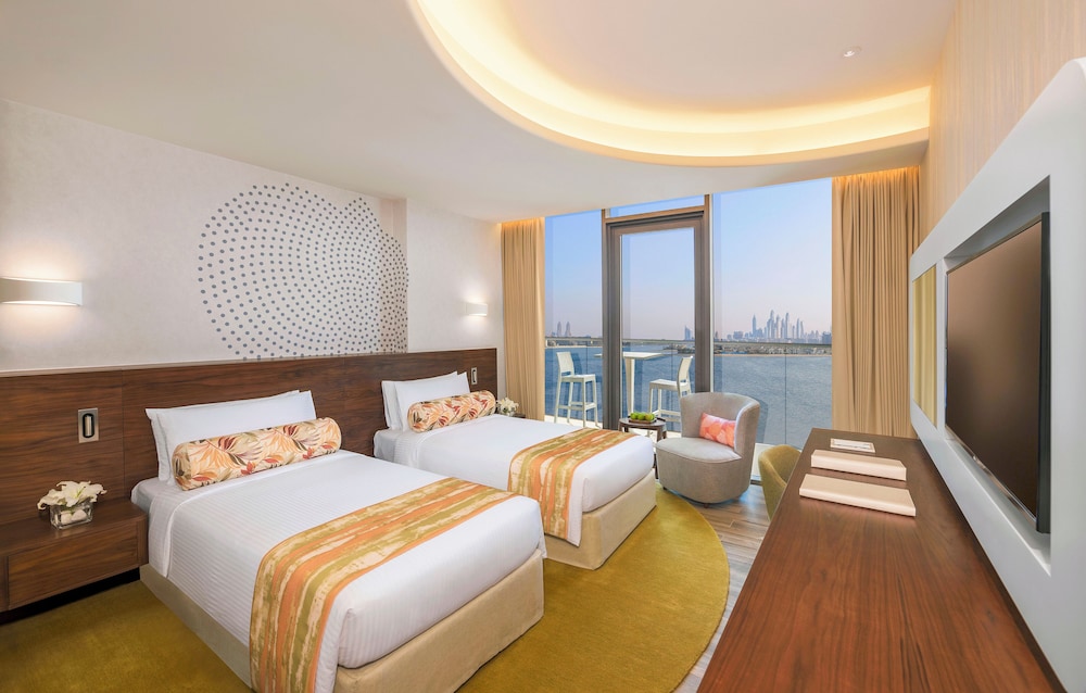 Habitación Premium con Balcón, Vista al Mar de Palmeras y Acceso al Salón Club del hotel The Retreat Palm Dubai - MGallery by Sofitel. Foto 4