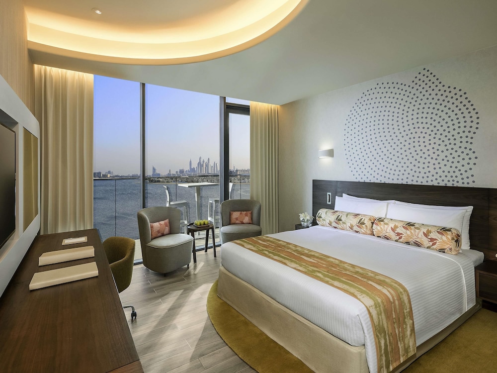 Suite Deluxe de un dormitorio con Balcón, Vista Parcial al Mar de Palmeras y Acceso al Salón Club del hotel The Retreat Palm Dubai - MGallery by Sofitel. Foto 8