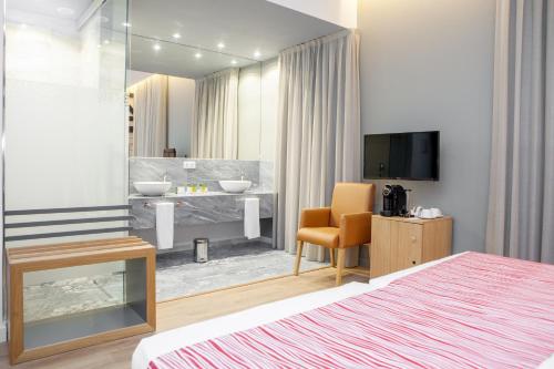 Habitación Doble - 1 o 2 camas del hotel Soho Boutique Capuchinos and Spa. Foto 3