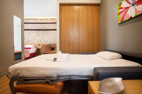 Habitación Familiar del hotel Soho Boutique Capuchinos and Spa. Foto 4