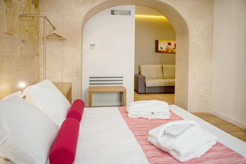 Habitación Familiar del hotel Soho Boutique Capuchinos and Spa. Foto 7