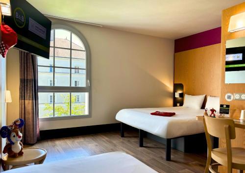 Habitación Triple del hotel B&B près de Disneyland Paris. Foto 2