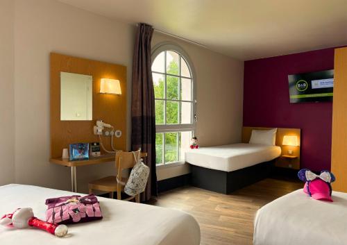 Habitación cuádruple del hotel B&B près de Disneyland Paris. Foto 3