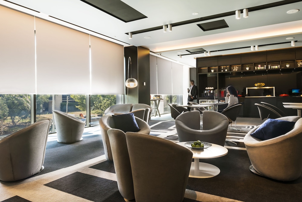 Habitación Deluxe Executive King, Beneficios Executive, Piso Alto del hotel Pullman Sydney Airport. Foto 10