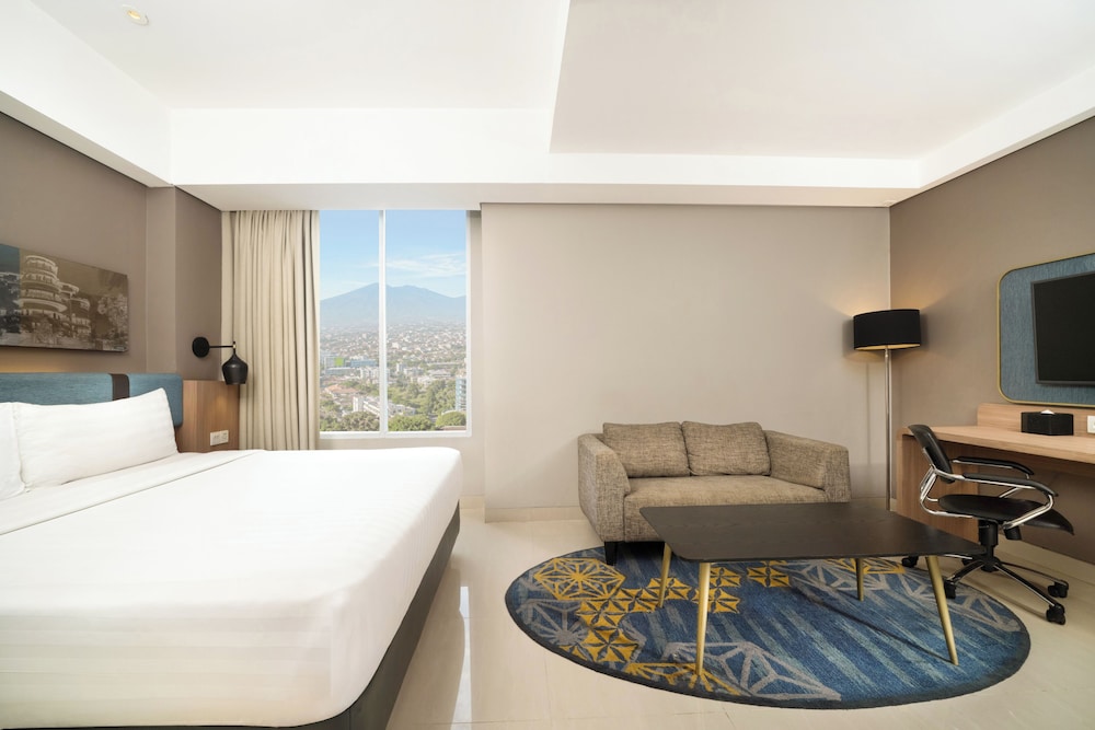 Suite Deluxe con 1 Cama Doble del hotel Mercure Bandung Nexa Supratman. Foto 3
