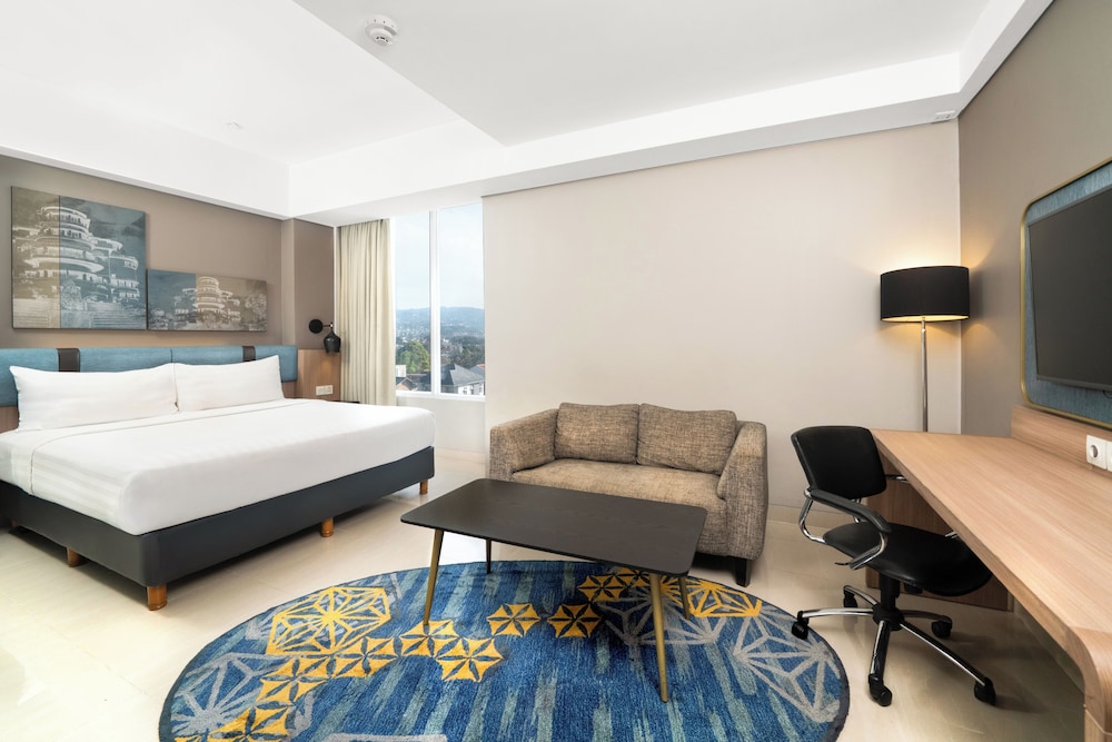 Suite Deluxe con 1 Cama Doble del hotel Mercure Bandung Nexa Supratman. Foto 4