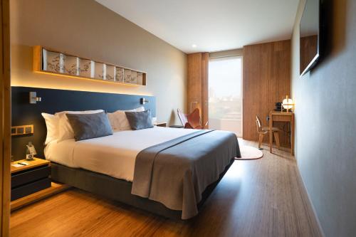 Habitación Deluxe del hotel Eurostars Barcelona Central. Foto 7