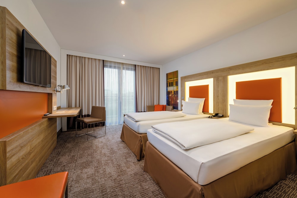 Habitación Estándar con camas gemelas del hotel Novotel Nuernberg Centre Ville. Foto 1