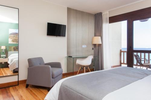 Double Room with Balcony and Sea View del hotel El Mirador De Fuerteventura. Foto 1