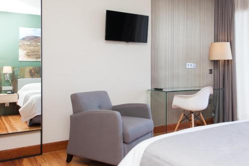 Habitación Cuádruple Confort del hotel El Mirador De Fuerteventura. Foto 2