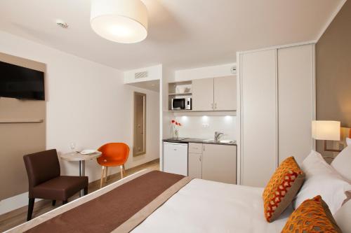 Estudio con 1 cama doble o 2 individuales del hotel Residhome París Rosa Parks