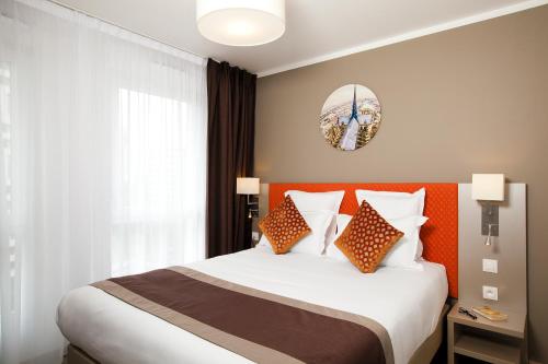 Estudio con 1 cama doble o 2 individuales del hotel Residhome París Rosa Parks. Foto 1