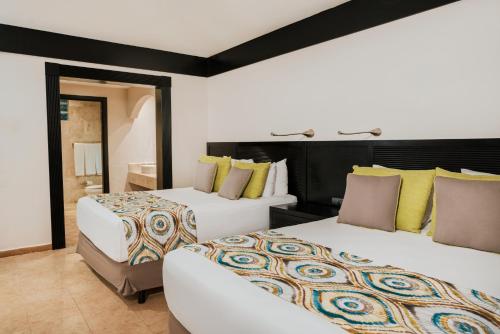 Habitación Premium del hotel Catalonia Playa Maroma. Foto 5