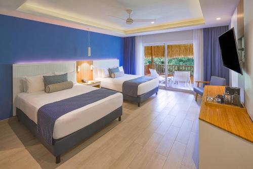 Habitación Prémium Deluxe del hotel Catalonia Playa Maroma. Foto 2