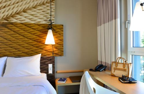 Habitación Doble del hotel Ibis Muenchen Airport Sued. Foto 9