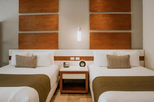 Suite Junior Deluxe con vistas parciales al mar del hotel The Reef 28 and Spa - Luxury Adults Only - All Suites - With Optional All Inclusive. Foto 2