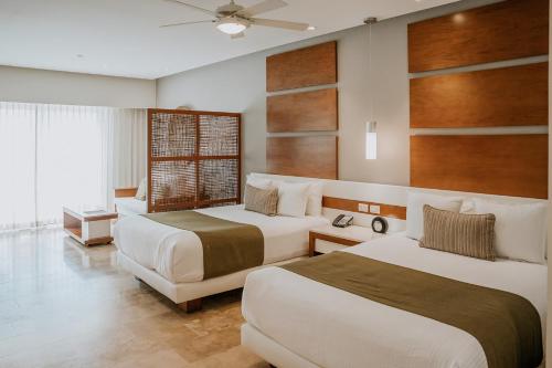 Suite Junior Deluxe con vistas parciales al mar del hotel The Reef 28 and Spa - Luxury Adults Only - All Suites - With Optional All Inclusive. Foto 4