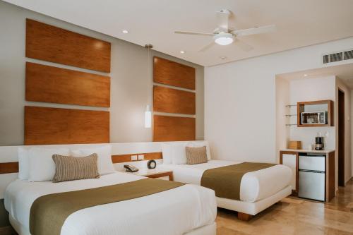 Suite Junior Deluxe - 2 camas grandes del hotel The Reef 28 and Spa - Luxury Adults Only - All Suites - With Optional All Inclusive