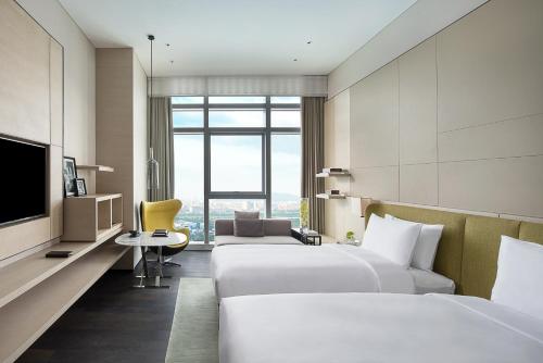 Superior Twin Room Morden Style (Twin bed) del hotel Sofitel Foshan. Foto 2
