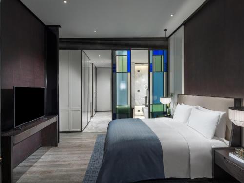 Luxury Room Club Millesime Chinese Style (King bed) del hotel Sofitel Foshan. Foto 2