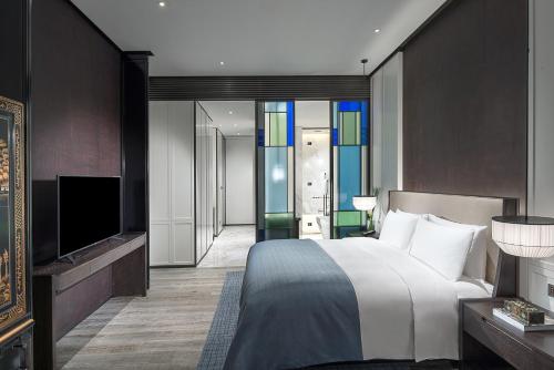 Luxury Room Club Millesime Chinese Style (King bed) del hotel Sofitel Foshan. Foto 3