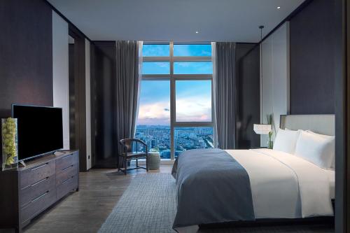 Luxury Premium Room Chinese Style (King bed) del hotel Sofitel Foshan. Foto 3