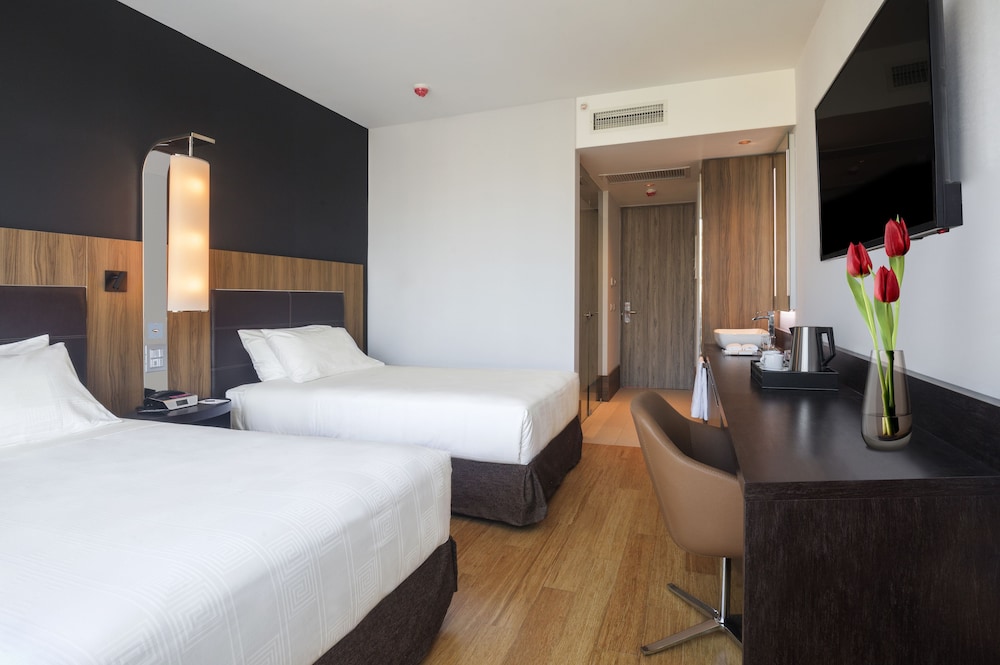 Habitación Deluxe con 2 camas individuales del hotel Icon. Foto 1