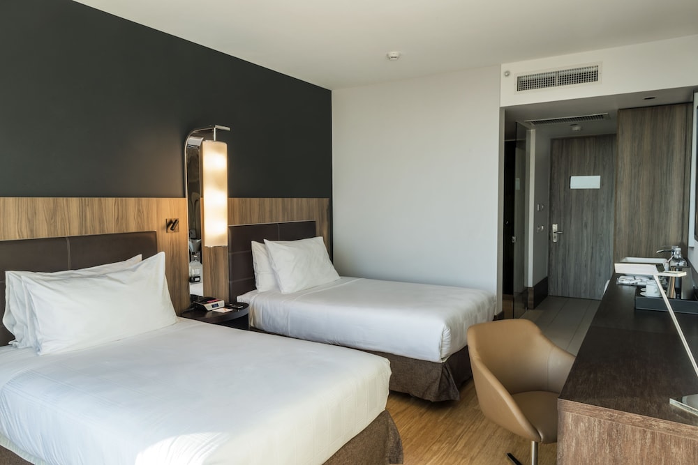 Habitación Deluxe con 2 camas individuales del hotel Icon. Foto 7